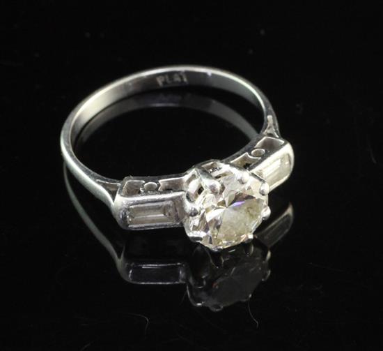 A platinum set solitaire diamond ring, size M.